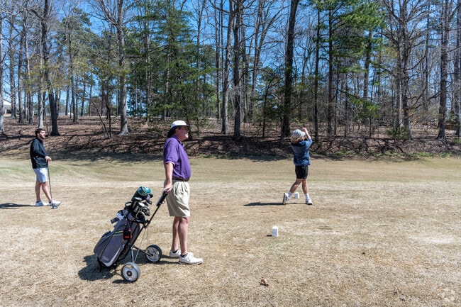 Golfers love playing a round or practicing at the range at Jamestown Park Golf Course.