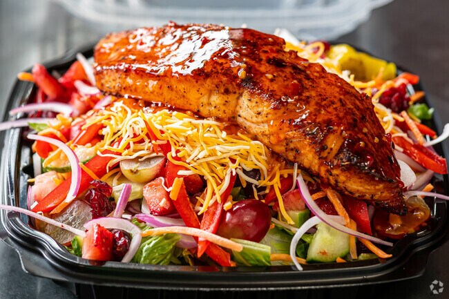 Glazed salmon salad is a house specialty at Taste 778 in Blue Hills.