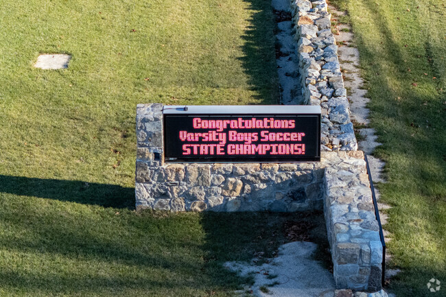 An electronic message board lies at the street front of Westport Junior/Senior High School.