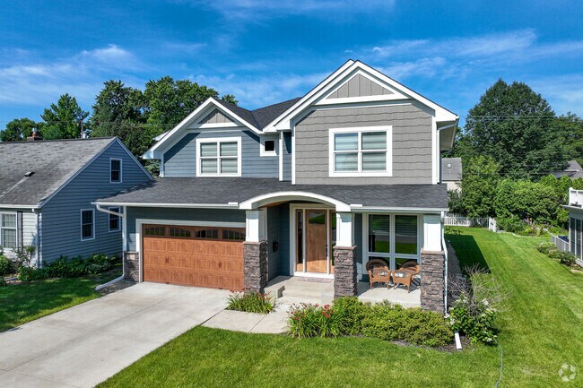 New traditional-style homes sit on redeveloped lots in the Chowen Park/Creek Knoll neighborhood.