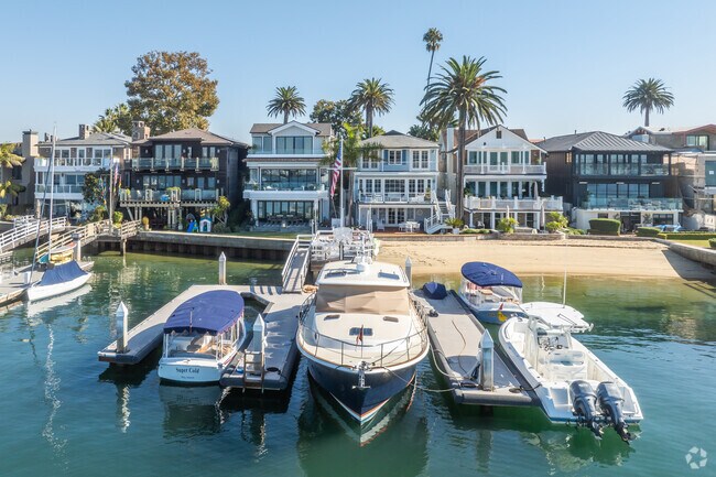 In Central Newport Beach, Newport Bay homes often come with docks with boats or yachts.