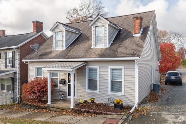 Cape Cod homes appear on Waynesburg’s outskirts with simple, timeless design.
