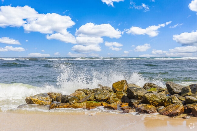Ocean waves meet rocks in a West Boynton scene.
