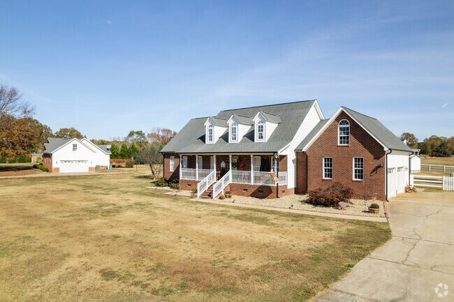 Many 2-story homes sit on large plots of land in McConnells, SC.