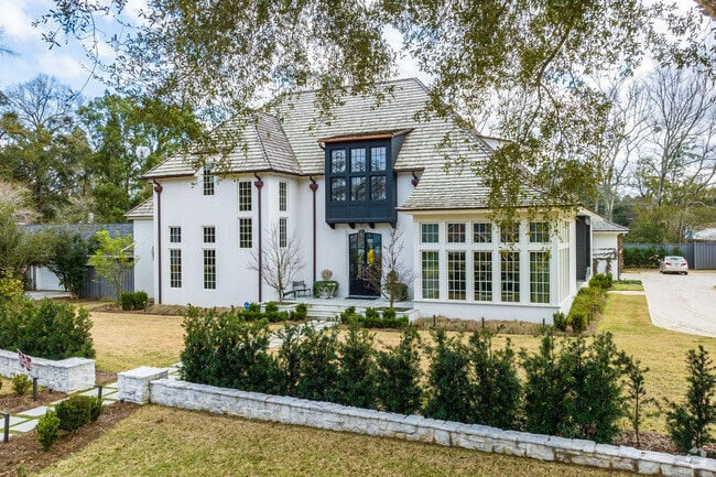 Here is a grand Manor home in Park Hill of Mobile, AL with black trimmings.