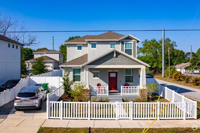 Midtown Tampa corner-lot home with a fenced yard.