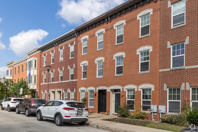 Some houses in the Hawthorne neighborhood have a small patch of grass.