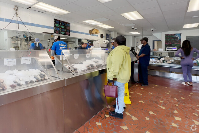 Customers are able to grab a variety of  fresh seafood at George's Seafood in Elmhurst.