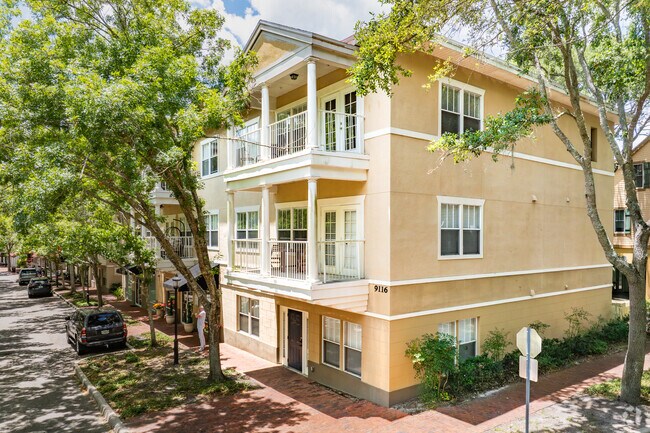 Condos with shops underneath line Haile Plantation.