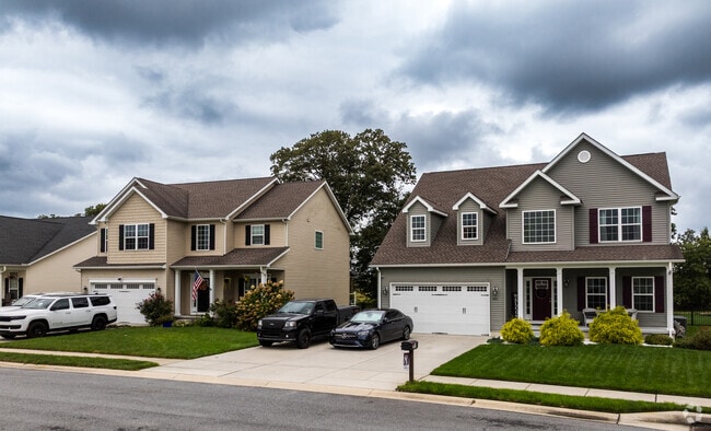 Traditional and Colonial Revivals line the streets.