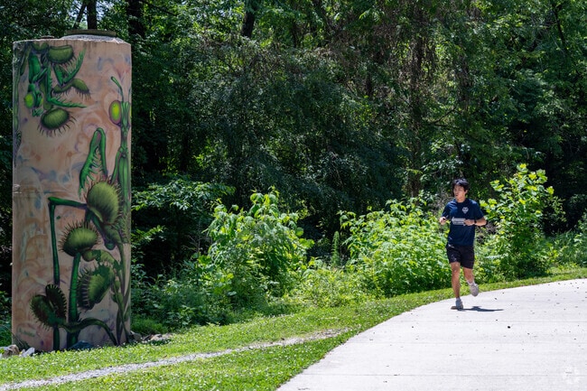 The Bolin Creek Trail is a popular place to run and enjoy the artwork along the path within the Northside neighborhood.