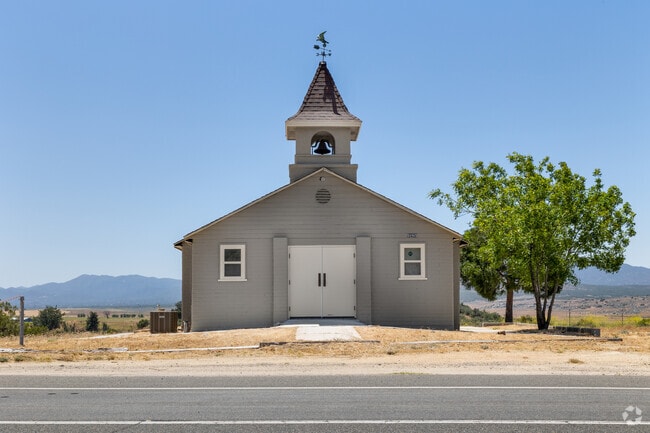 Historic church building sits on land with a view of Anza Valley.