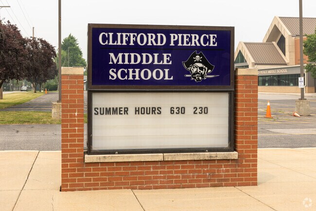Clifford Pierce Middle School sign, summer hours, 6:30-2:30 Schererville, IN.