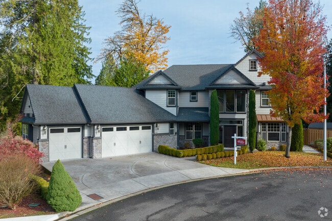 Newer homes with large garages can be found throughout Oatfield, like this home on SE Robhil Dr.