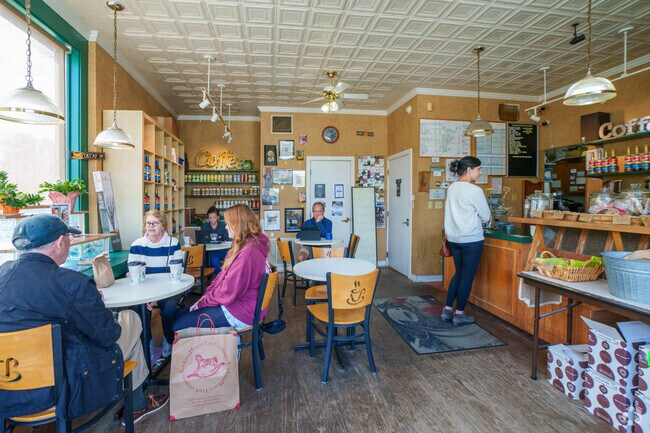 Answer emails or engage in conversation with friends at Wheeling Coffee Shop in Pleasanton.