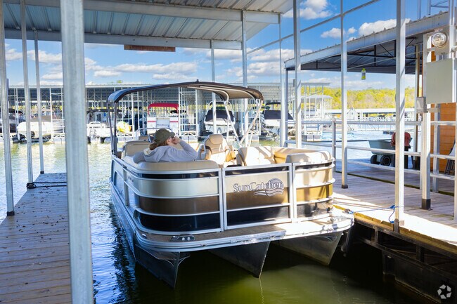 Pontoon boats in Indian Point Marina are ready for summer fun at Table Rock Lake.