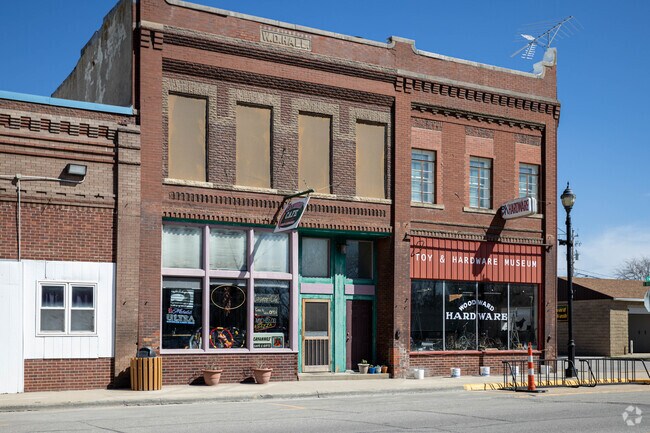 In the center of Woodward's Main Street, the Toy & Hardware Museum shares a building with Cayanne's Cafe.