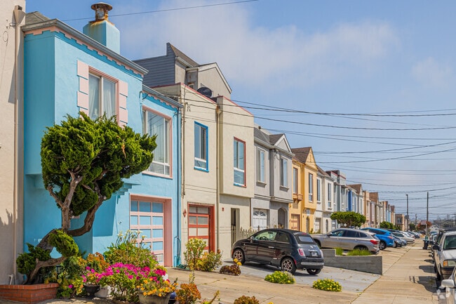 Rows of colorful stucco homes line the streets of the Outer Sunset.