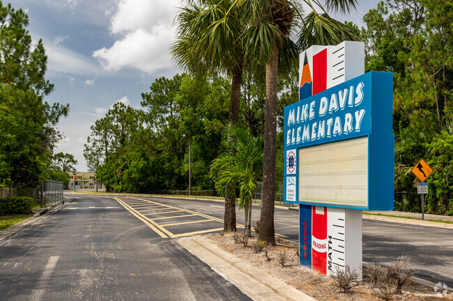 Mike Davis Elementary in Naples has a long driveway leading to the front entrance.