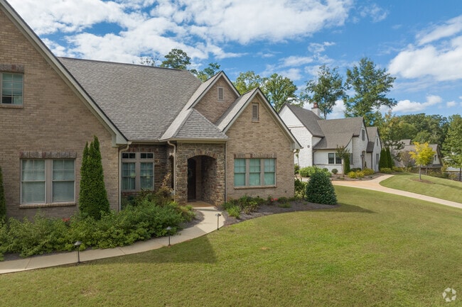 Farmhouse-style homes in Cary Woods boast well-maintained lawns.
