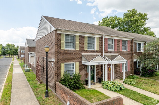 Modern townhomes comprise the Royal Court, a gated community in the Central Waterfront.