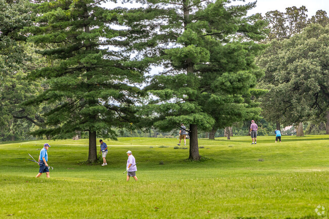 Residents enjoy a day on the golf course at Phalen Regional Park.