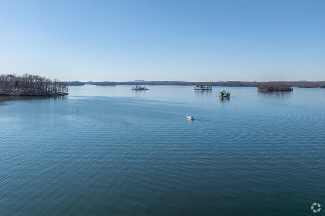 Lake Lanier spans an expansive area of approximately 38,000 acres, showcasing a shimmering expanse of water that captivates visitors.