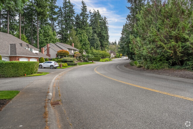 Rows of homes line winding streets through the hilly, coastal neighborhood of Wind and Tide.