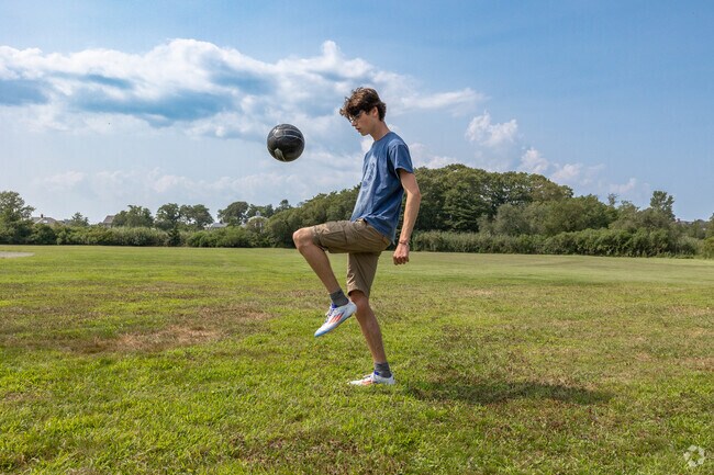 A local resident works on his foot juggling in Woods Hole Park.