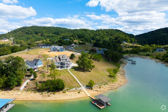 Large waterfront homes line the shores of Norris Lake in Chuck Swan.