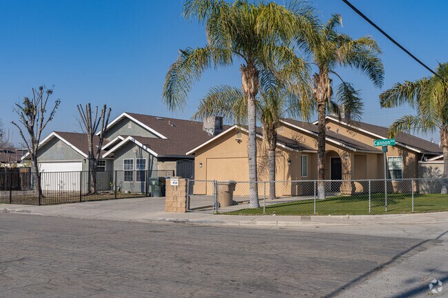 Large palm trees can help shade the homes of Casa Loma from the hot sun.
