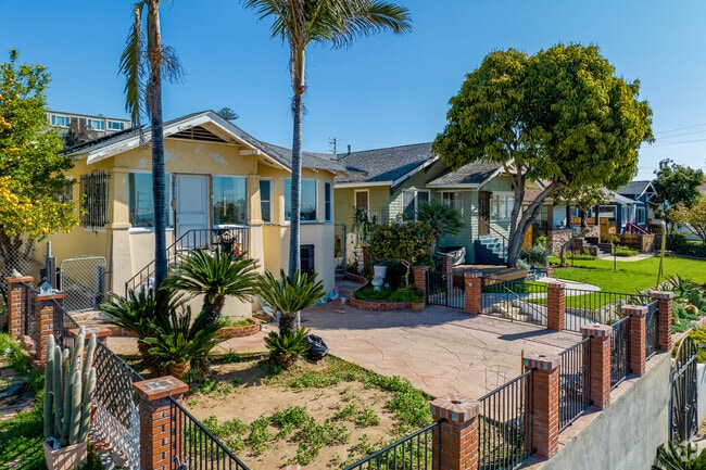 Front lawns are often planted with mature and exotic trees.