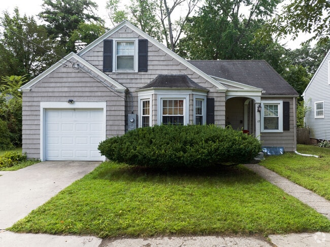 A lovely wood shingled custom cape in the Bay area of Springfield, MA.