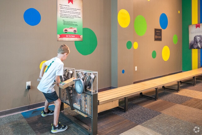 Kids of Indiana State University learn the laws of physics at the Terre Haute Children's Museum.