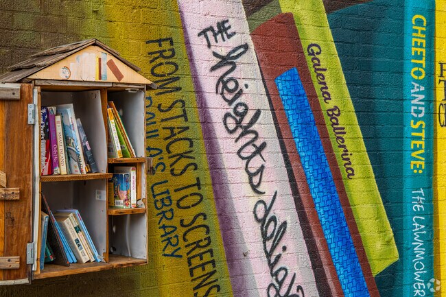 Discover the vibrant mural and community library on Vliet Street in Wick Field.