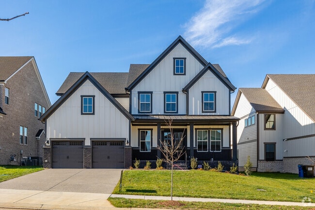 Homes in a newly developed community in the Triune Area are of the Craftsman style.