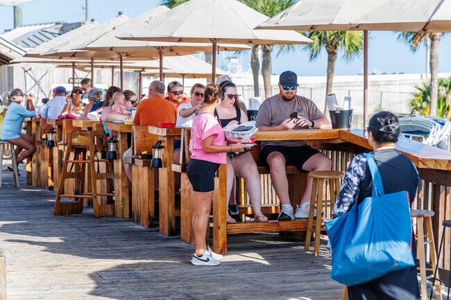 Off The Hook Bar and Grill offers outdoor waterfront dining with a casual atmosphere and great food in Upper Grand Lagoon.