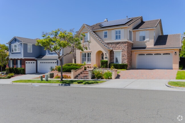 Because of the weather, many homes have solar panels in the neighborhood.