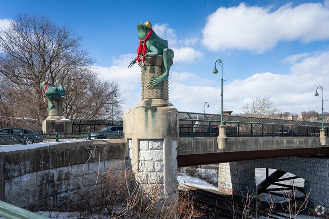 Giant frog statues welcome drivers as they cross the bridge into downtown Willimantic, CT.