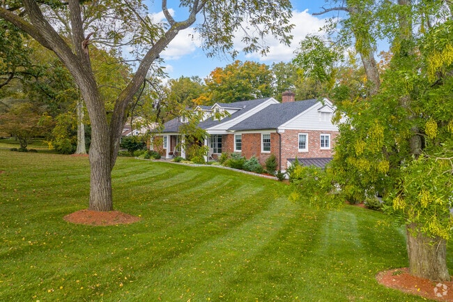 Shaded ranchers sitting on large lots in Upper Providence Township are cooled by towering trees.