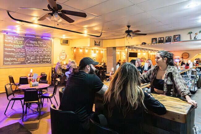 Residents enjoy a fun night out at Champion Beach House Bar & Grill in Champion Heights.