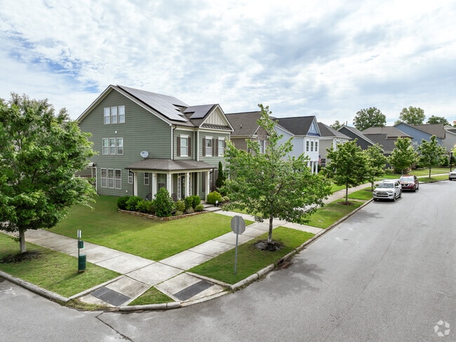 A row of two-story homes in Highland Creek