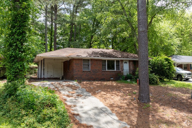 Classic brick homes are common throughout Rosedale Heights, nestled among mature pines and deep front yards.