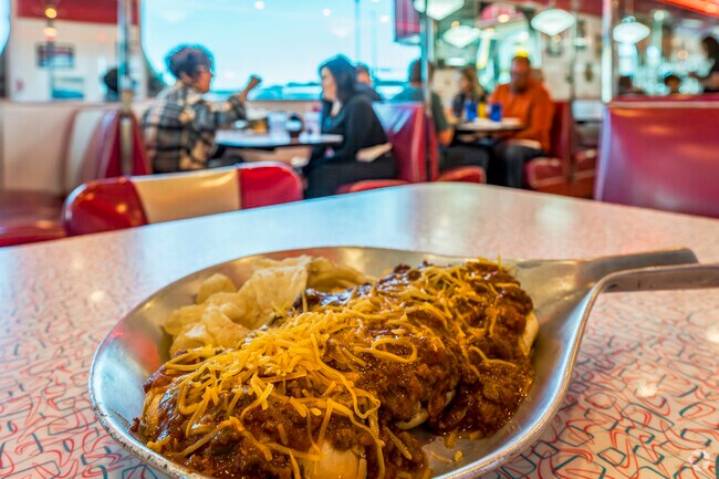 Kroll’s Diner serves up the classic open-faced Chili Burger in Village West.
