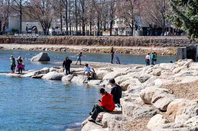 Large flat rocks create the perfect lounge to swim or people watch in Riverwalk.