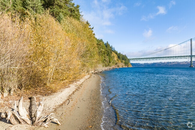 The beach area at Narrows Park offers views of the Narrows Bridge.