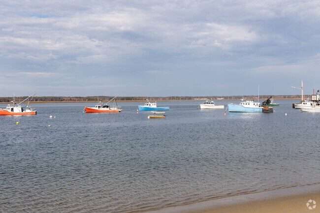 Boats are anchored offshore in Seabrook.