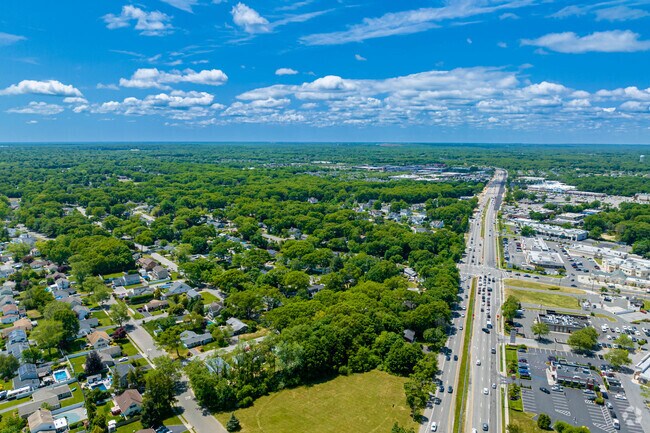 The peaceful north corner of Lake Grove and its surrounding neighborhoods are in the midst of plenty of greenery and trees.