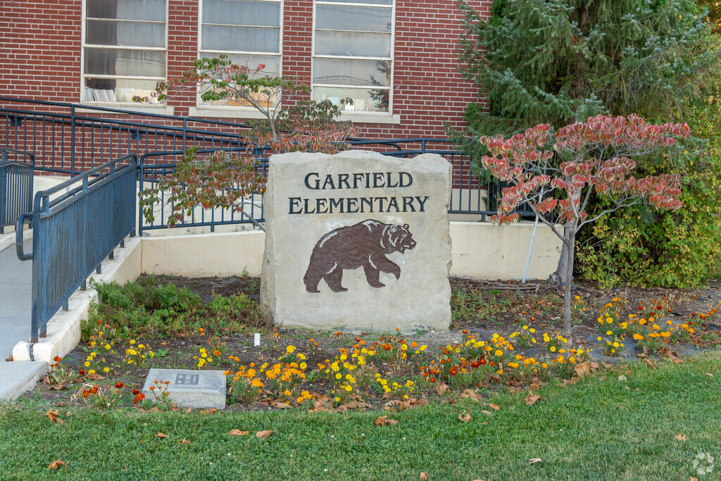 Near the Garfield Elementary School entrance is a small sign with the school mascot.