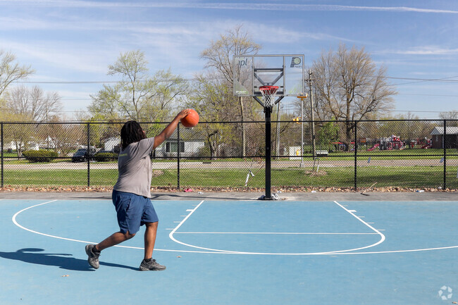Basketball is a popular past time in Indianapolis with outside courts near Devonshire.